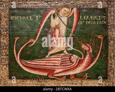 Barcelona, Spain - Dec 26th 2019: Saint Michael struggling the dragon, secene from Altar frontal of the Archangels, Master of Sant Pau de Casserres. N Stock Photo