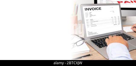 Businessman work Using The Computer Calculating  Invoice In Office Invoice Form and Accountant Checking Invoice Stock Photo
