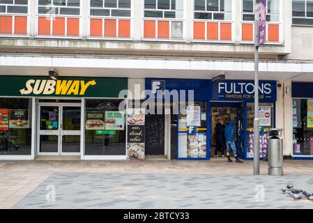 Sheffield UK –  April 30 2020: closed restaurants and an open grocery store – essential and non-essential business in Sheffield during the coronavirus Stock Photo