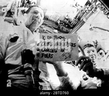 On October 14, 1968, the Apollo 7 crew became the first to broadcast live on television from space. In this photo, Walter M. Schirra Jr. (right) and Donn F. Eisele are seen during the first live television transmission. Stock Photo