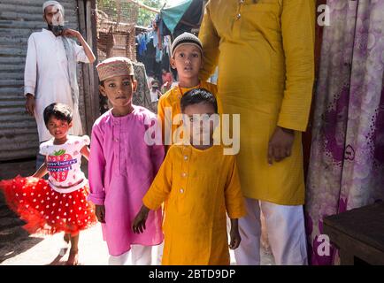 New Delhi, India. 25th May, 2020. Children celebrate Eid al-Fitr outside their home during lockdown to curb the spread of COVID-19, in New Delhi, India, May 25, 2020. Credit: Javed Dar/Xinhua/Alamy Live News Stock Photo