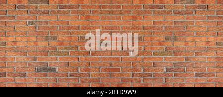 Old, red, roughly worked brick wall Stock Photo