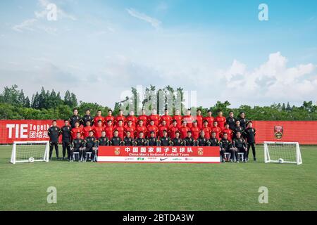 The group photo of China national football team while they train in Shanghai, China, 18 May 2020. Back row: Huang Weitao, Zhang Lin, Li Lei, Yang Fan, Tan Long, Cai Huikang, Wang Dalei, Yan Junling, Liu Dianzuo, Yang Xu, Dong Xuesheng, Li Ang, Zhang Linpeng, Yu Dabao, Sui Han, Chen Xi Middle row: Kang Kebao, Zhang Tengfei, Chi Guozhong, Li Ke, Wei Shihao, Zhang Xizhe, Jiang Zhipeng, Liu Binbin, Wuxi, Ai Kesen, Luo Guofu, Wang Sangchao, Song Junmin, Ming Tian, Liu Yun, Tang Miao, Jin Jingdao, Du Lida, Zhang Yanrui Front row: Huang Zhuping, Hu Zhuowei, Chen Xiangning, Xin Feng, Xue Shen, Zheng B Stock Photo