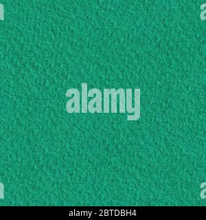 Textured dark green paper as background. Seamless texture. Tile ready. Stock Photo