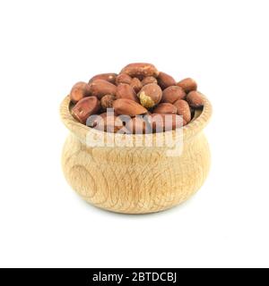 Peanuts in wood bowl close up isolated on white background. Stock Photo