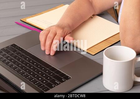Work From Home for Social Distancing in Coronavirus Covid-19 Situation, Woman Designer Using Laptop on table at Her Home Stock Photo