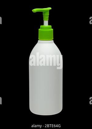 Liquid soap in plastic white bottle isolated on black background. Stock Photo