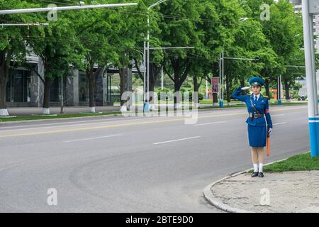 The Pyongyang traffic police women are beautiful scenery in the streets. Pyongyang, North Korea Stock Photo