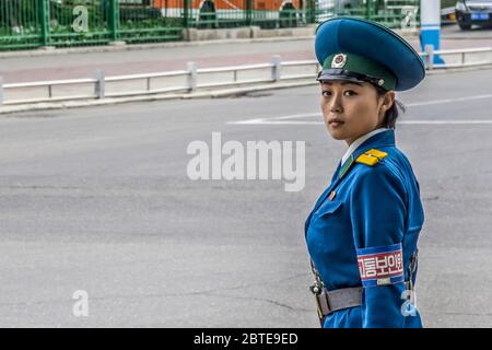 The Pyongyang traffic police women are beautiful scenery in the streets. Pyongyang, North Korea Stock Photo