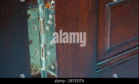Close up of house door hinges Stock Photo