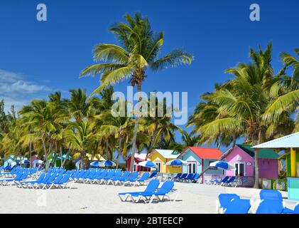 ELEUTHERA, BAHAMAS - MARCH 21, 2017 : Colorful bungalows on Princess Cays beach. Princess Cays is an exclusive port of call of Princess Cruises line Stock Photo