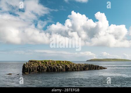Summer view of small islands on outskirts of Torshavn city, capital of Faroe Islands, Streymoy island, Denmark. Landscape photography Stock Photo