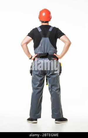 Thoughtful worker looking up on white background Stock Photo