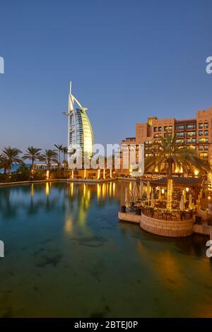 Burj Al Arab hotel at dusk, Dubai, United Arab Emirates (UAE) Stock Photo
