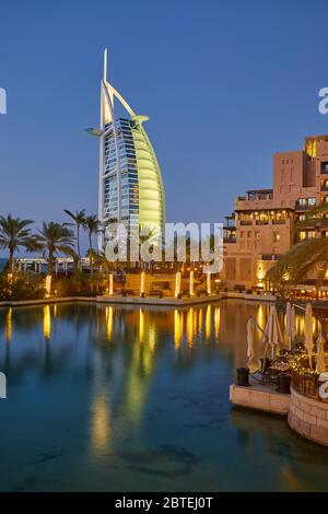 Burj Al Arab hotel at dusk, Dubai, United Arab Emirates (UAE) Stock Photo