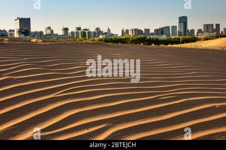 (200525) -- YULIN, May 25, 2020 (Xinhua) -- File photo taken in June, 2015, shows a desert on the outskirts of Yulin City, northwest China's Shaanxi Province. Yulin City, which used to suffer from severe soil erosion and desertification, has been making efforts on afforestation since April, 2017. In November of 2019, the city was granted the status of National Forest City. (Photo by Zhang Jinguo/Xinhua) Stock Photo