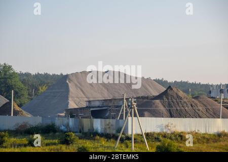 Heaps of rubble and gravel for the production of concrete and reinforced concrete structures. Stock Photo