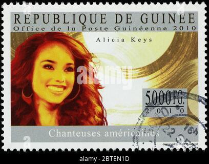 Alicia Keys on postage stamp of Guinea Stock Photo