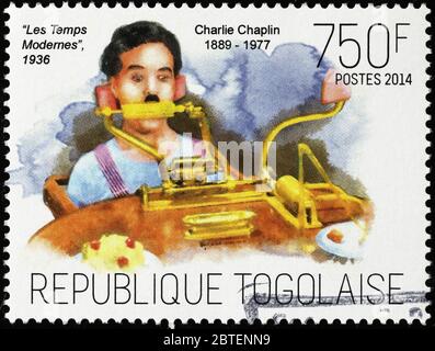 Charlie Chaplin in the Adventurer of 1917 on stamp Stock Photo