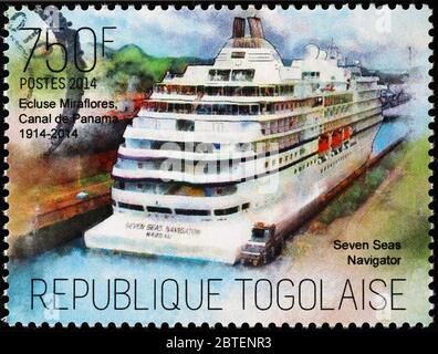 Cruise Seven seas navigator in Panama canal on stamp Stock Photo