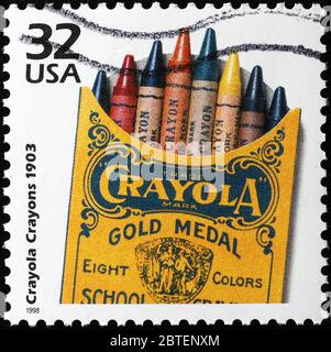First box of Crayola crayons in 1903 celebrated on stamp Stock Photo