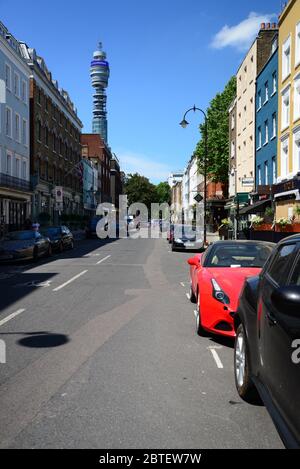 Empty Charlotte Street, Fitzrovia with the Post Office Tower in view, London, during the London Lockdown, as a result of the 2020 Coronavirus Pandemic Stock Photo