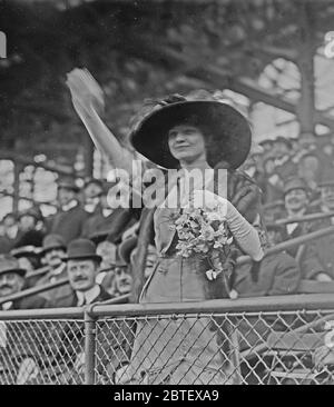 Miss Genevieve Ebbets, youngest daughter of Charley Ebbets, throws first ball at opening of Ebbets Field ca. 1913 Stock Photo