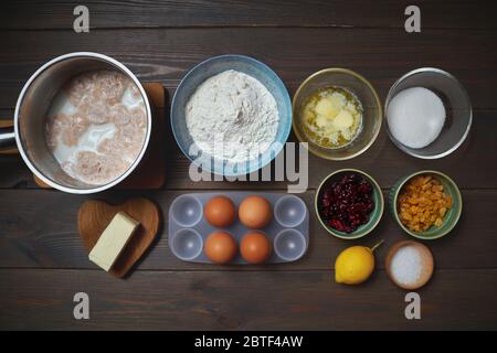 Process of cooking Easter cake cruffin, decorated with dried fruit and nuts. Stock Photo