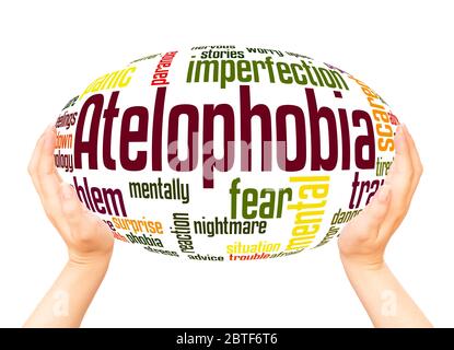 Atelophobia fear of imperfection  word hand sphere cloud concept on white background. Stock Photo