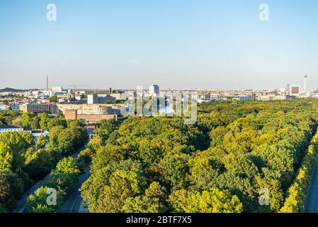 Panoramic city view of Berlin, viewfrom the top of the Berlin Victory Column in Tiergarten, Berlin, with modern skylines and green forest. Stock Photo