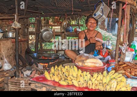 Woman sells produce in a small village near Siem Reap, Cambodia. Stock Photo