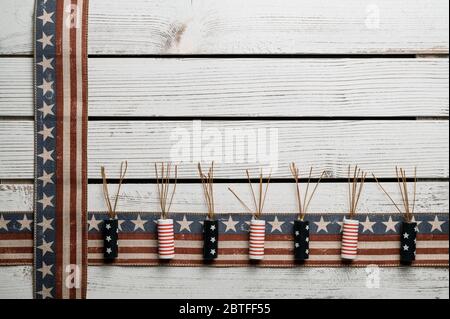 American stars and stripes flat lay over rustic wood background 4th of July memorial day in Americana style Stock Photo