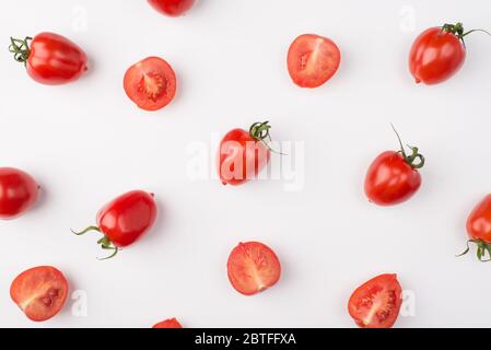 Top above overhead view photo of cherry tomatoes isolated on white background Stock Photo