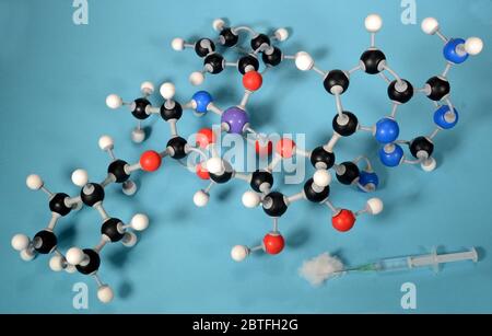 Molecule model of the antiviral preparate remdesivir that may be able to calm the symptoms of Covid 19 virus. White is Hydrogen, black is Carbon, blue Stock Photo