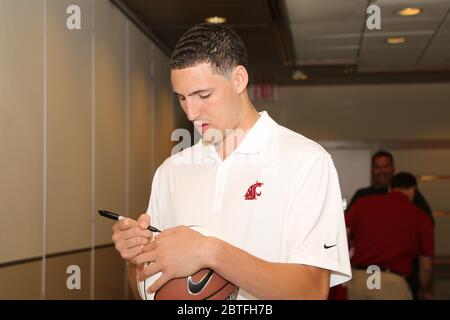 Klay Thompson, NBA superstar with the Golden State Warriors, autographing basketballs. Stock Photo
