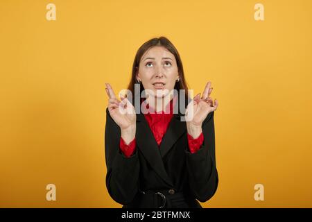 Female Waiting With Crossed Fingers And Hopes. Success, Good Luck To People Stock Photo