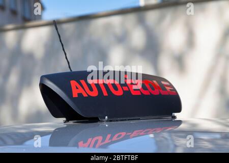 Car Roof Sign With Written In It In French Auto Ecole Meaning In English Driving School Stock Photo Alamy