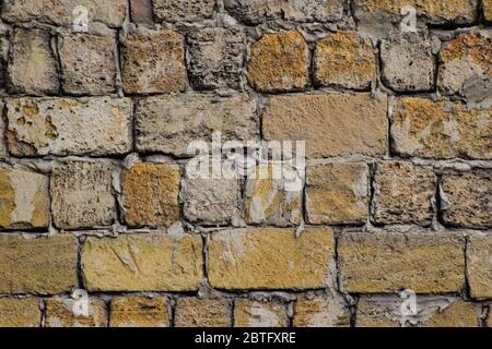 a shadow from the blocks of limestone shell. Wall texture background Stock Photo