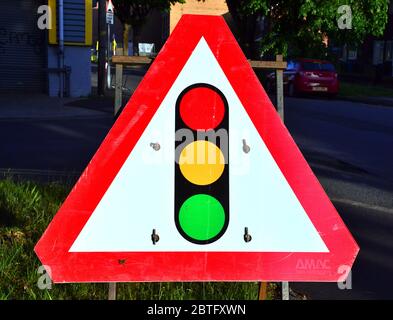 Sign on a road in uk to tell motorists that there are temporary traffic lights ahead Stock Photo
