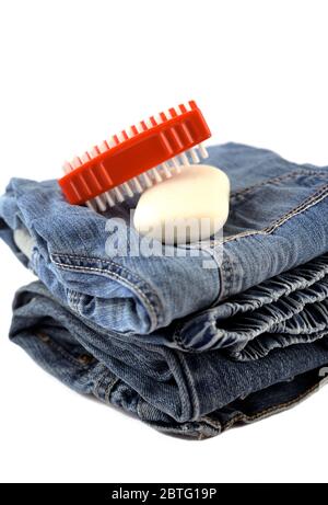 Jeans close up with brush and soap Stock Photo
