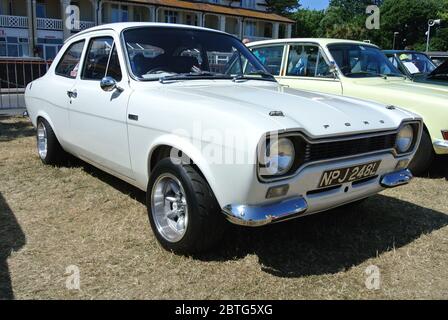 A Ford Escort Mk1 parked up on display at the English Riviera classic car show, Paignton, Devon, England, UK. Stock Photo