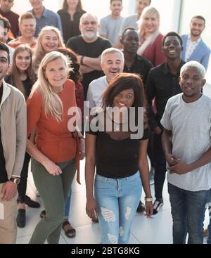 Group of business people smiling in an office Stock Photo