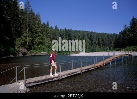 Hiker bridge-Smith River, Jedediah Smith Redwoods State Park, Redwood National Park, California Stock Photo