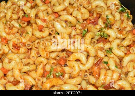 Gourmet Tasty Italian Penne Pasta on a Plate. Stock Photo