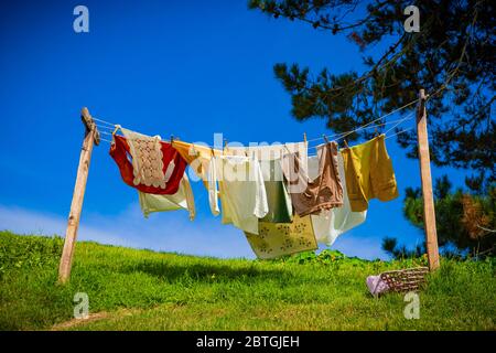 A clothesline in the sun and breeze at the Hobbiton movie set location near Matamata, New Zealand