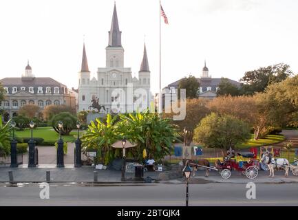 Horse buggies in front of St Louis Cathedral, Jackson Square, French Quarter, New Orleans, Louisiana, USA Stock Photo