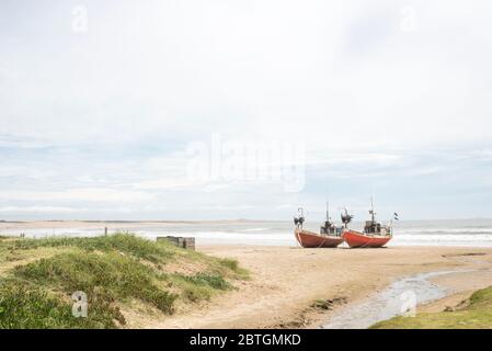 Cabo Polonio, Rocha / Uruguay; Dec 30, 2018: couple of boats on the shore of the beach Stock Photo