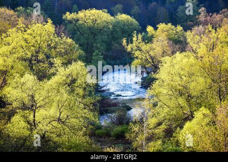 Springtime comes to the rural landscape of the state of Vermont, New England, USA, North Branch of Winooski River. Stock Photo