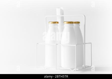 High key, white artwork image of used bottles. Still life black and white art of recycled waste objects displayed as pretend milk containers Stock Photo