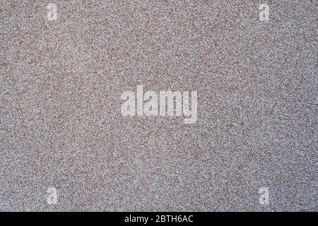 close view of the wall surface, decorative finishing, heat insulation granules or granite particles Stock Photo